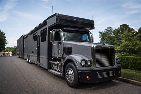 This $425k Freightliner Coronado Haulmark Conversion Includes A Motorhome And A Garage | Carscoops