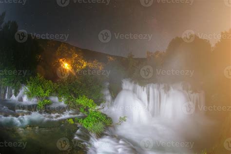 waterfalls in night 10428103 Stock Photo at Vecteezy