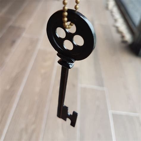 Coraline Black Button Key | Coraline aesthetic, Coraline, Unique items products