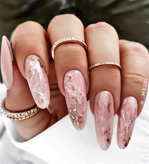 Most Beautiful Nail Designs You Will Love To wear In 2021 : Pink marble nails with subtle glitter