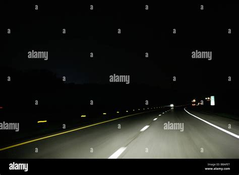 Multiple lane highway, night, non-urban scene Stock Photo - Alamy