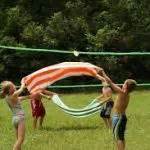 Play A Game of Water Balloon Volleyball