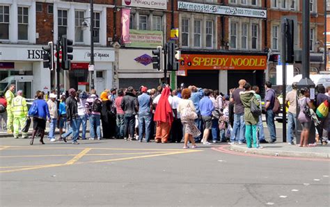 Brixton remains closed after overnight riots and looting – photos