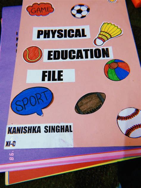 a pink book with some stickers on it