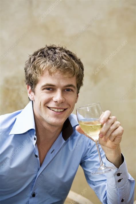 Man drinking wine - Stock Image - F003/9992 - Science Photo Library