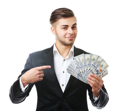 Premium Photo | Man holding money isolated on white