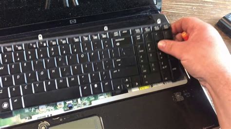 How to remove and install a keyboard in a HP Pavilion DV7 laptop - YouTube