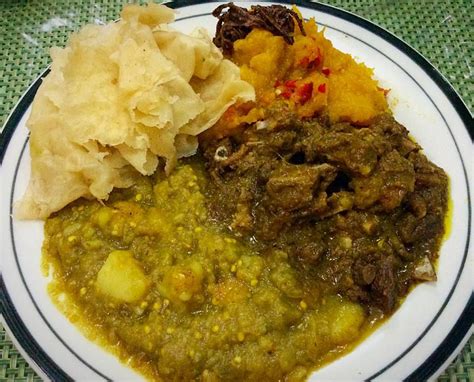 Trini Food - Buss-up-Shut Paratha Roti, Curried Goat, Baighan & Aloo ...