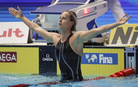 Italy's Federica Pellegrini celebrates after winning the women's 200m freestyle final at the ...