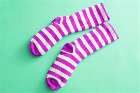 Free Image of Colorful pair of striped pink socks | Freebie.Photography