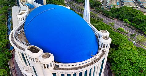 Blue and White Round Building Near City · Free Stock Photo