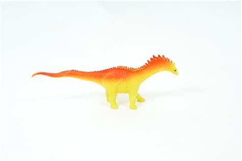 Premium Photo | Dinosaur. plastic rubber toy isolated on white.