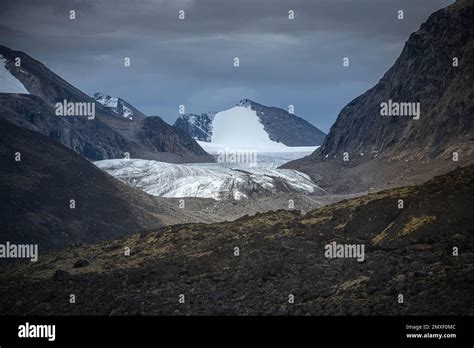 The tongue of Tupermit Glacier in Akshayuk Pass. Auyuittuq National ...