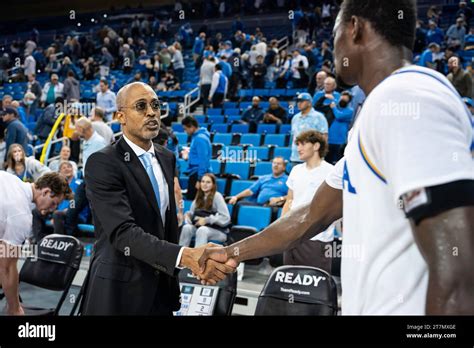 LIU Sharks head coach Rod Strickland congratulates UCLA Bruins forward ...