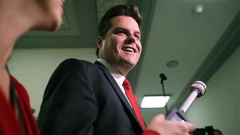 Florida Congressman Matt Gaetz hit by flying drink cup