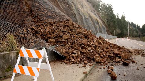 Rock slide closes part of River Road S