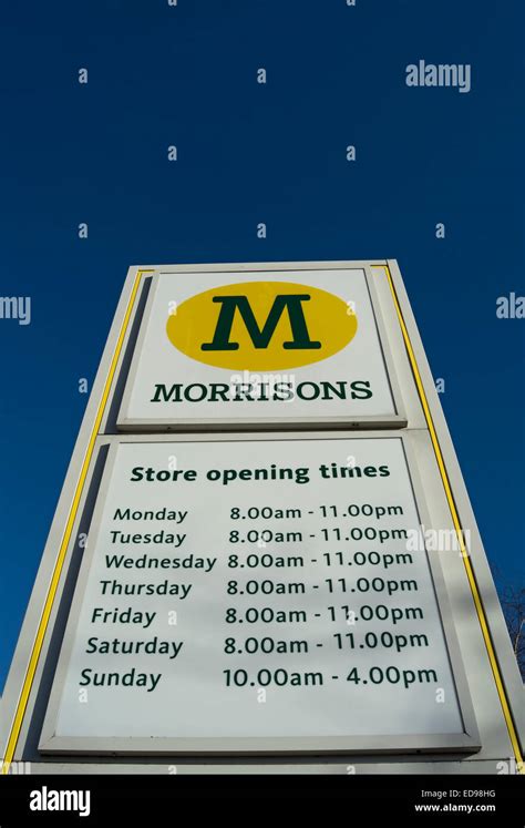 pillar sign with name and opening times for a branch of morrisons ...