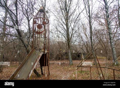 Scary and abandoned playground in a village near Pripyat, a ghost city in the Chernobyl ...