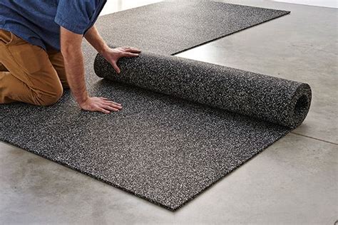 Rubber flooring installation for home and commercial gyms. | Rolled ...