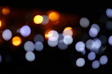 Defocused Image of Illuminated Lights at Night · Free Stock Photo