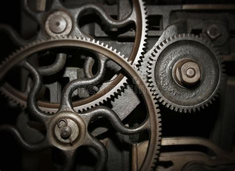 Cogs in a machine. Cog and wheel details from machines of the ...