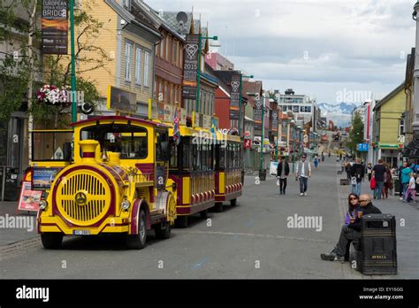 Norway, Tromso, Downtown Tromso. The Arctic Train, a sightseeing tram ...