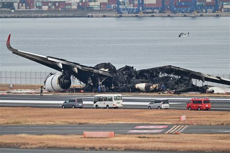 Runway warning lights were broken at time of Japan Airlines plane fire ...