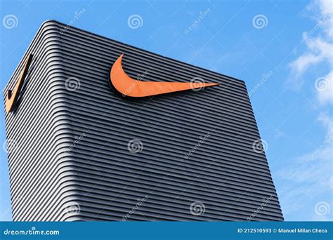 Badalona, Barcelona, Spain - February 28, 2021. Sign on the Facade of Nike, an American ...