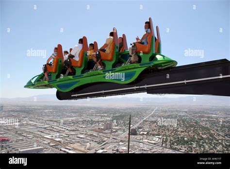 People enjoying the X Scream ride at the top of the Stratosphere Stock ...