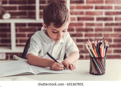 Cute Little Boy Writing Smiling While Stock Photo 631367831 | Shutterstock