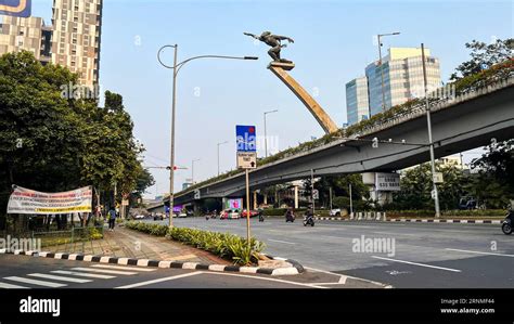 view of The Dirgantara Statue Monument or better known as the Pancoran Statue is one of the ...