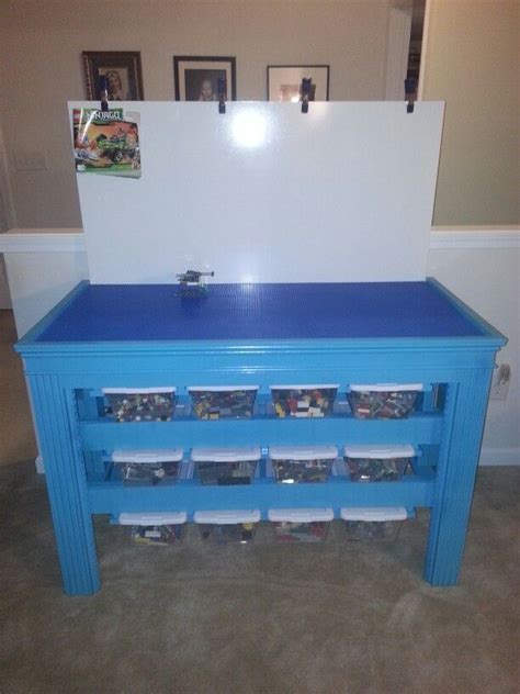 Lego table with 16 storage bins for my son built mostly from scraps that were in my garage. Top ...