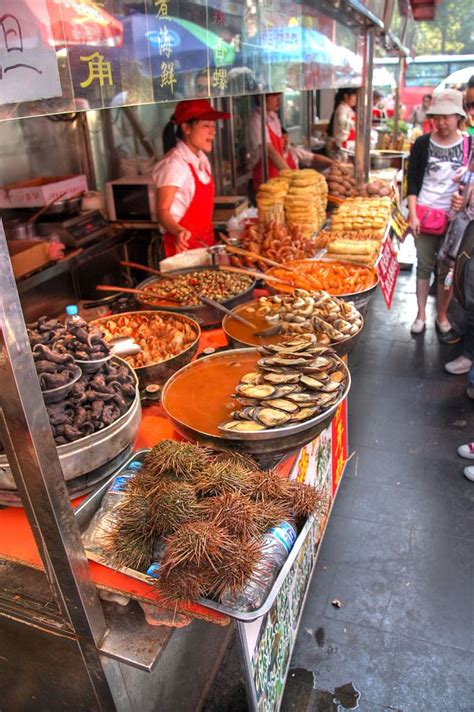 Food stand at the Wangfujing Snack Street in Donghuamen, Beijing_ China ...