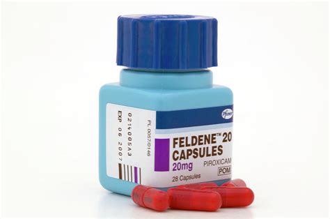 Feldene Drug Capsules Photograph by Science Photo Library