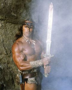ARNOLD SCHWARZENEGGER holding sword as Conan The Barbarian 8x10 photo | eBay