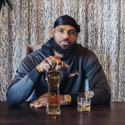 LEBRON JAMES SPORTS ALL FOUR CHAMPIONSHIP RINGS AS HE UNVEILS NEW BOTTLE FOR LOBOS 1707 EXTRA ...