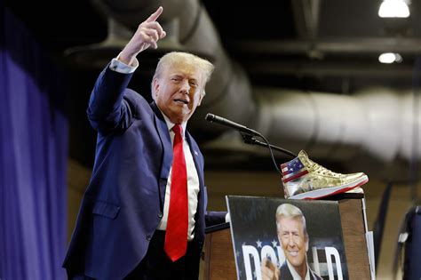 Donald Trump Booed While Promoting $399 Sneakers 1 Day After Court Orders Him to Pay $355 Million