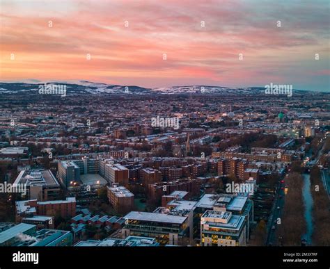 Red sky sunrise over snowy Dublin Mountains and a frosty Dublin Stock ...