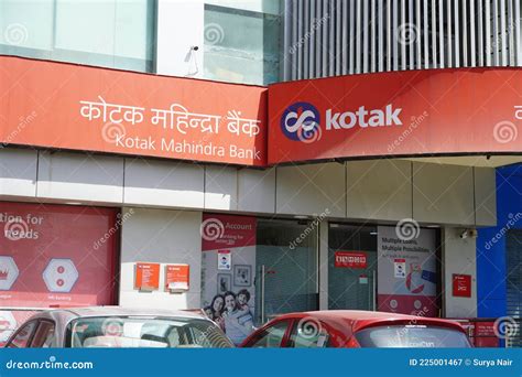 Sign Board: Kotak Mahindra Bank Sign Board Showing the Logo and Text ...