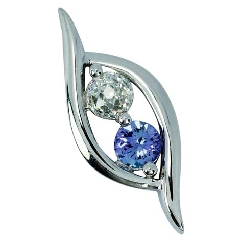 Crown of Light 14k White Gold .65ct Diamond and .38ct Round Tanzanite Pendant For Sale at 1stDibs