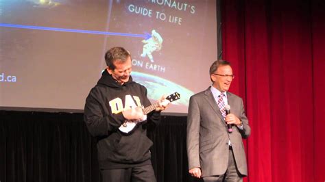 Chris Hadfield opens his gift guitar at Dalhousie - YouTube