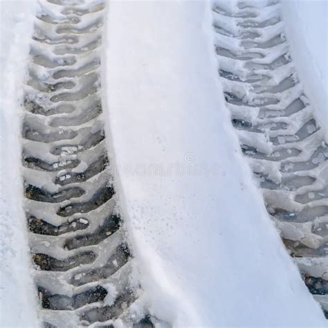 Tire Tracks on Snow Covered Road in Eagle Mountain Stock Photo - Image ...