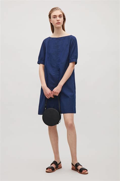 COS image 1 of Dress with elastic sleeves in Blue