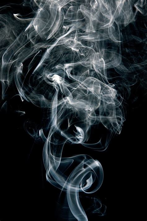 Royalty-Free photo: White smoke in black background | PickPik