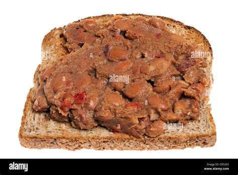 Spicy refried beans on toast Stock Photo - Alamy