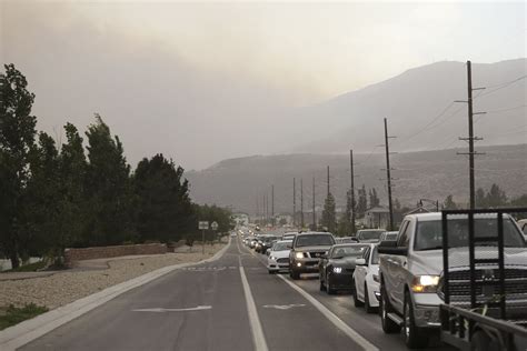 Thousands forced to flee in 2 close calls with fast-moving wildfires in Utah County Sunday ...