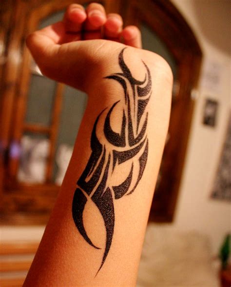 39 Awesome Tribal Wrist Tattoo Designs