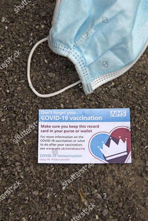 Covid19 Vaccination Card Alondside Discarded Face Editorial Stock Photo - Stock Image | Shutterstock