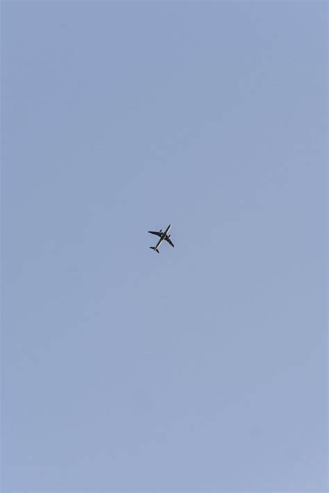 White Plane on Blue Sky · Free Stock Photo