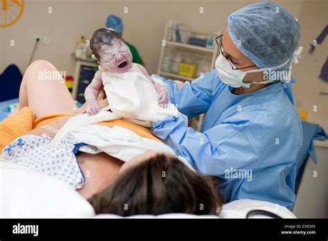 Woman in labor room during delivery, Obstetrics and gynaecology ...